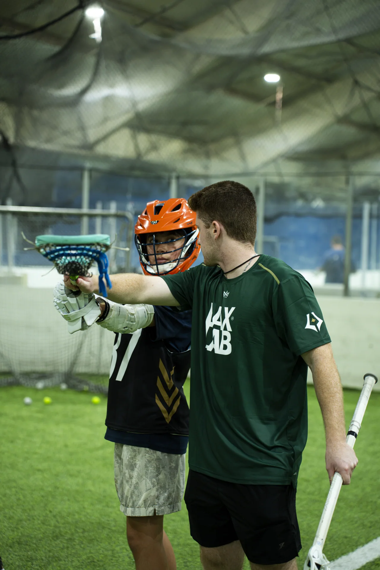 A coach and player talk through the finer points of the game